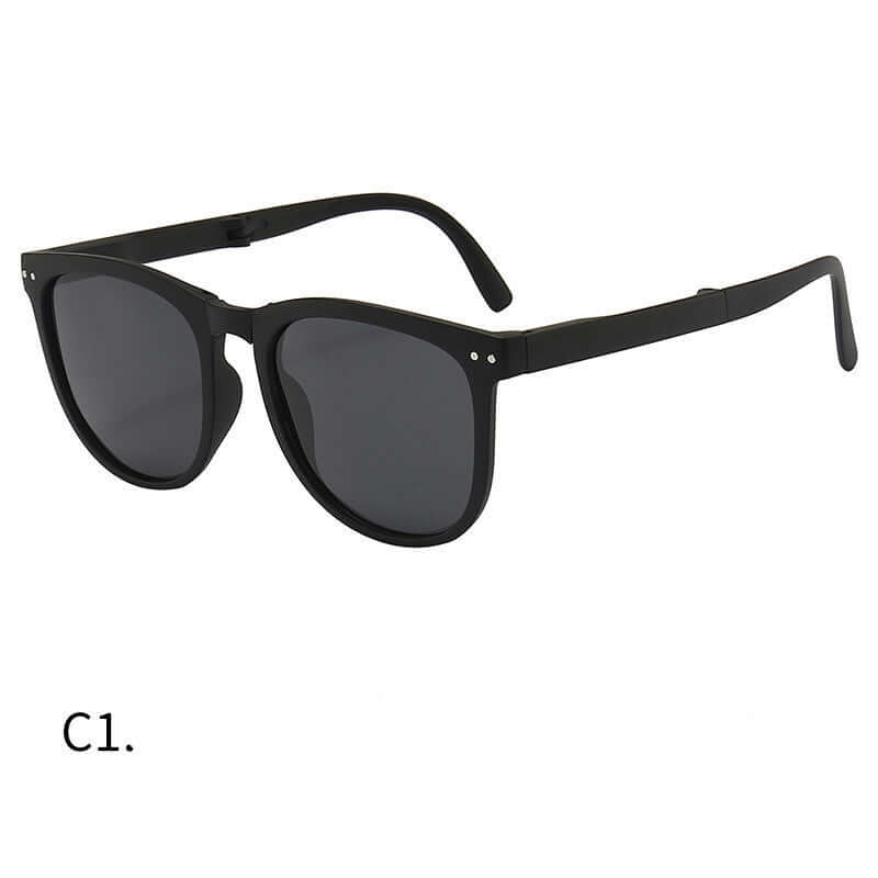 Trendy Foldable Sunglasses For Women TR Polarized Folding Sun Glasses with black frames and dark lenses.