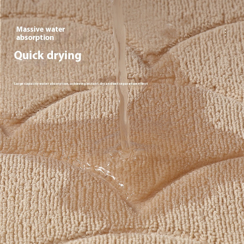 Tapis de sol absorbant antidérapant et moderne en éponge pour porte de salle de bain minimaliste.