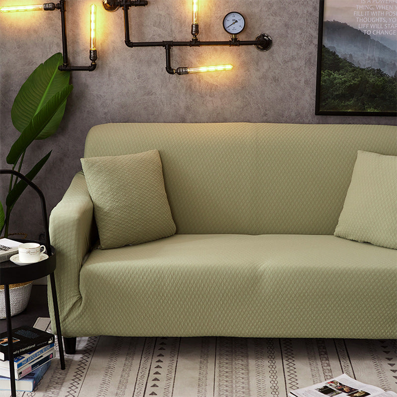 housse de canapé extensible imperméable de couleur unie