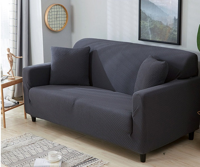 housse de canapé extensible imperméable de couleur unie