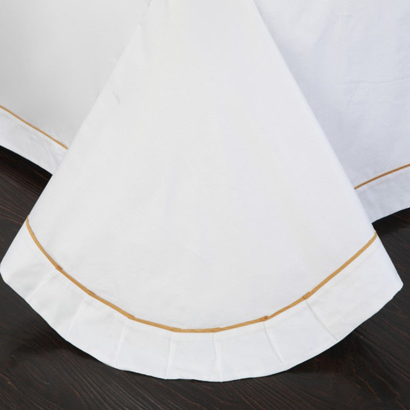 Ensemble de literie quatre pièces en coton