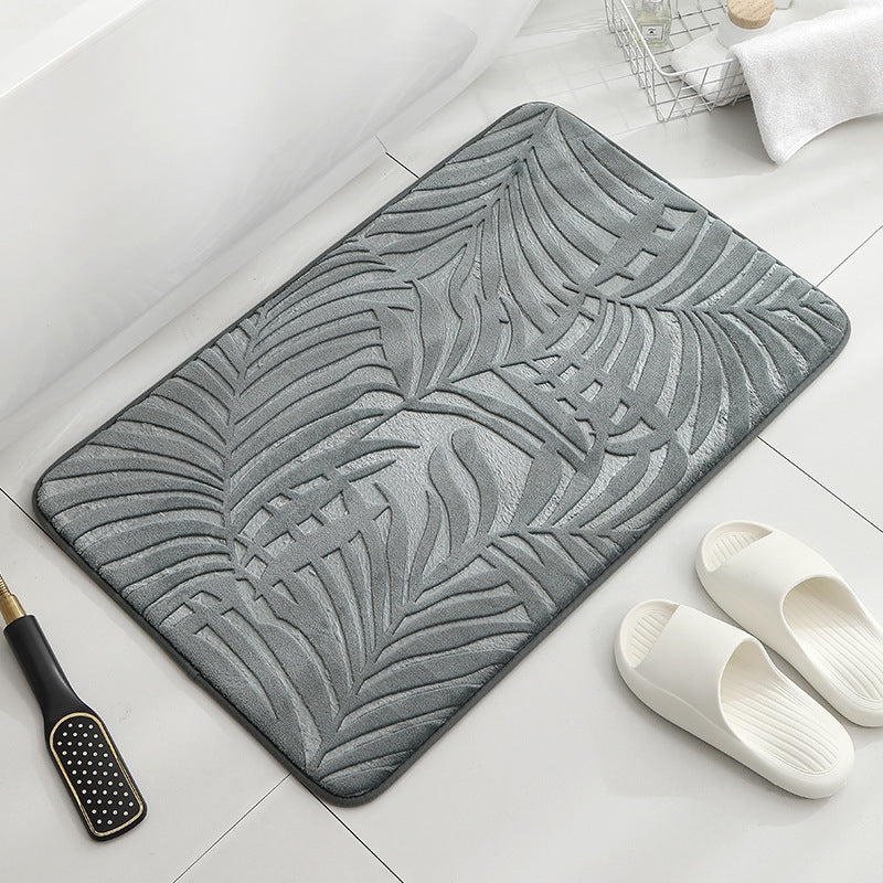 Tapis de sol absorbant antidérapant et moderne en éponge pour porte de salle de bain minimaliste.