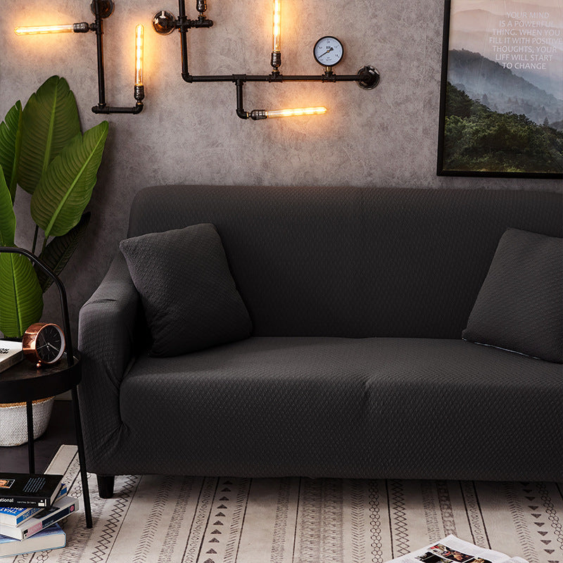 housse de canapé extensible imperméable de couleur unie
