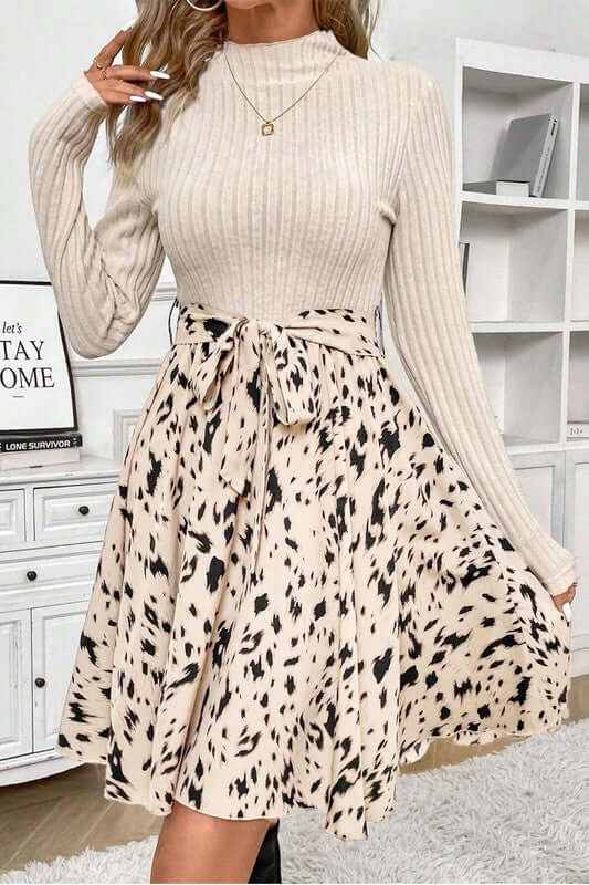 Ribbed Knit Patchwork Printed Belted A-line Dress with a fitted top and flared skirt, showcasing a stylish design.