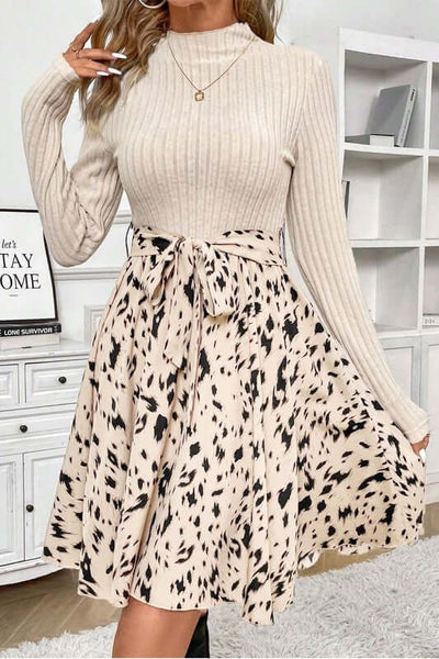 Ribbed Knit Patchwork Printed Belted A-line Dress with a fitted top and flared skirt, showcasing a stylish design.