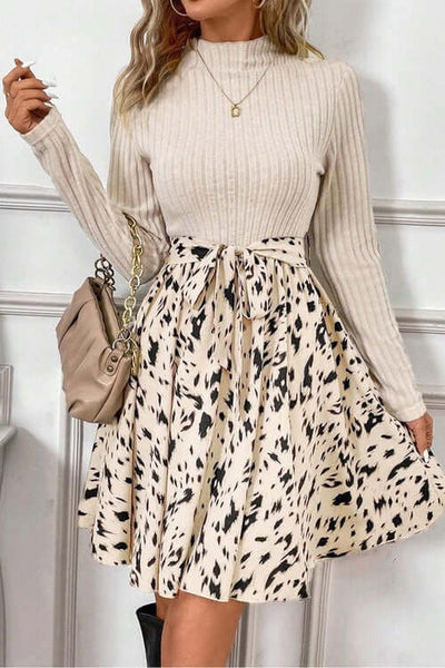 Ribbed Knit Patchwork Printed Belted A-line Dress featuring a stylish ribbed top and a playful printed skirt.