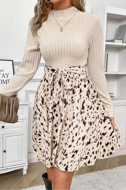 Ribbed Knit Patchwork Printed Belted A-line Dress featuring a stylish beige top and spotted skirt design.