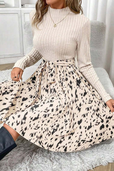 Ribbed Knit Patchwork Printed Belted A-line Dress featuring a textured top and printed skirt design.