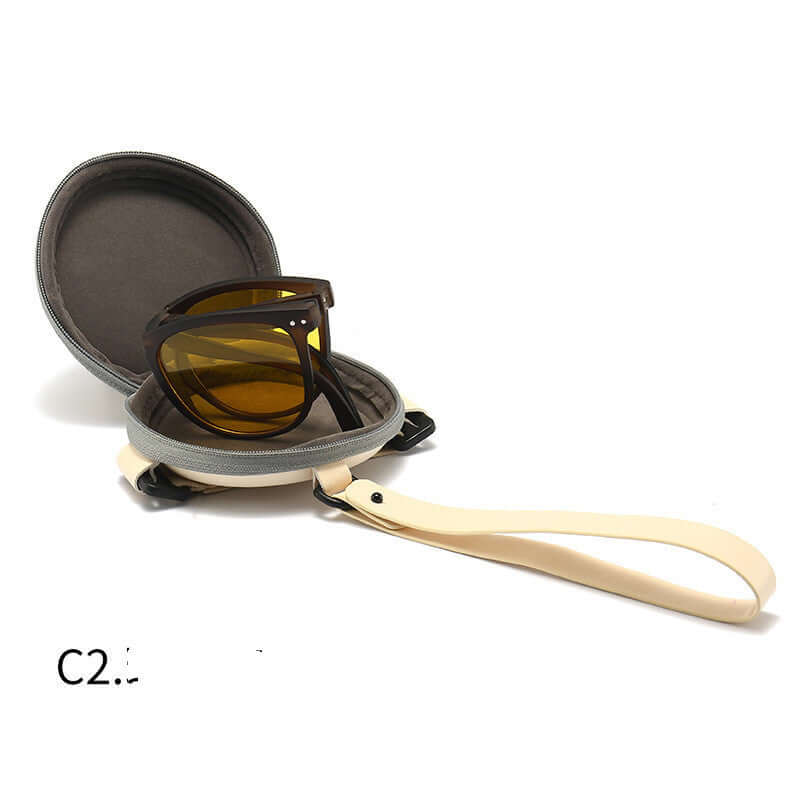 Trendy Foldable Sunglasses For Women TR Polarized Folding Sun Glasses inside a protective case with strap.