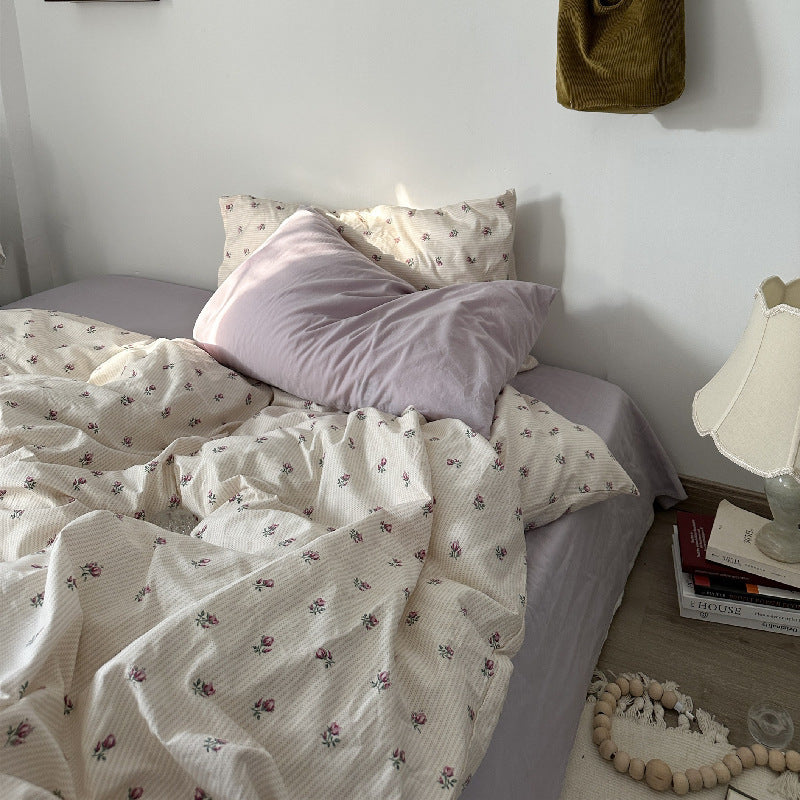 Ensemble de lit quatre pièces en coton : draps, housses de couette et draps-housses