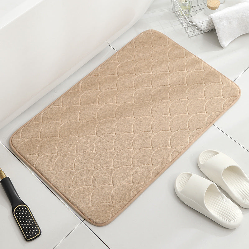 Tapis de sol absorbant antidérapant et moderne en éponge pour porte de salle de bain minimaliste.