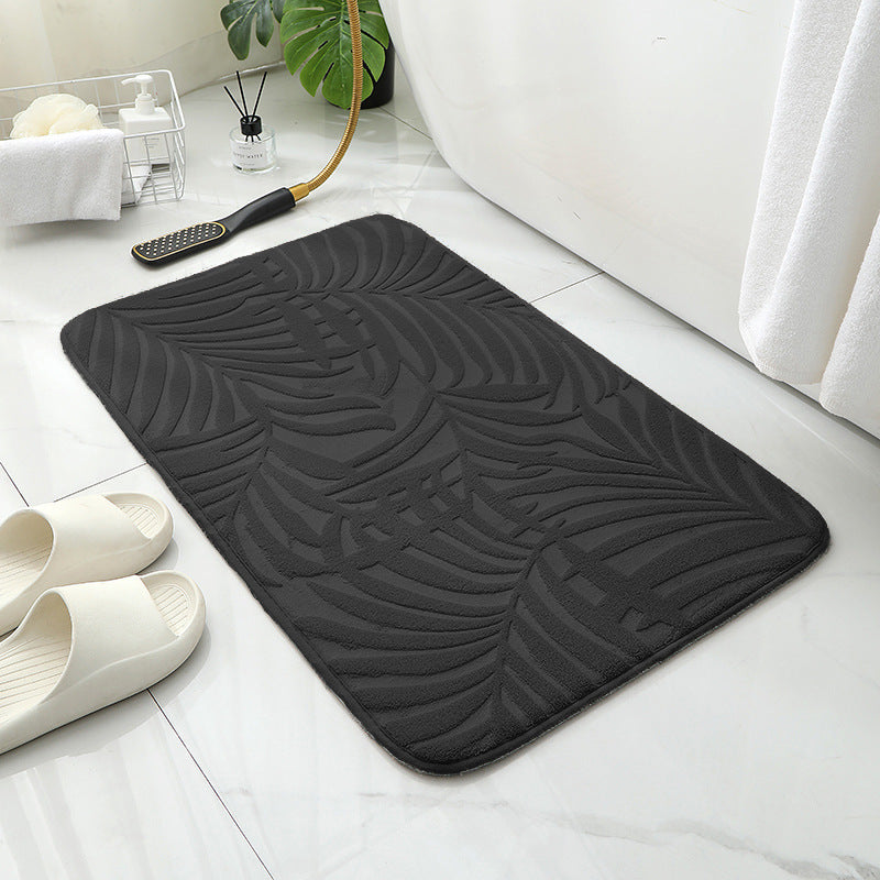 Tapis de sol absorbant antidérapant et moderne en éponge pour porte de salle de bain minimaliste.