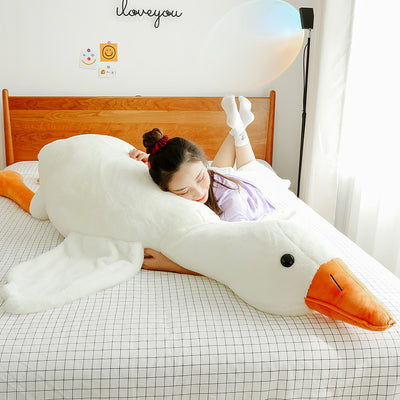 Coussin en peluche représentant une grosse oie blanche mignonne