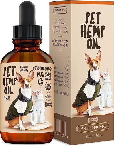 Hemp oil for dogs and cats in a bottle alongside dog and cat wearing sweaters.