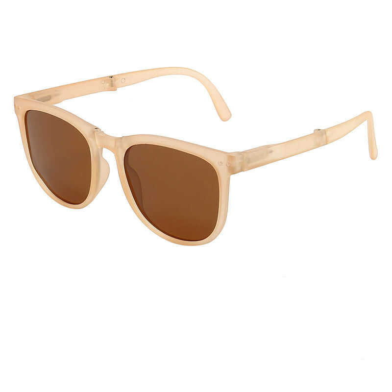 Trendy Foldable Sunglasses For Women TR Polarized Folding Sun Glasses in light beige frame with brown lenses.