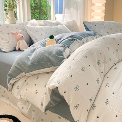 Ensemble de quatre pièces en coton filé nuage de classe A