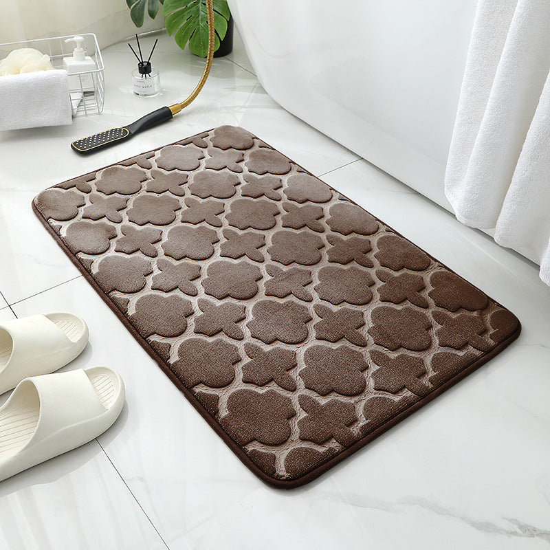 Tapis de sol absorbant antidérapant et moderne en éponge pour porte de salle de bain minimaliste.