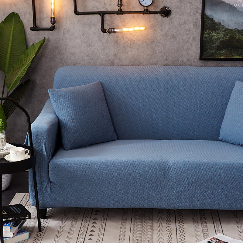 housse de canapé extensible imperméable de couleur unie