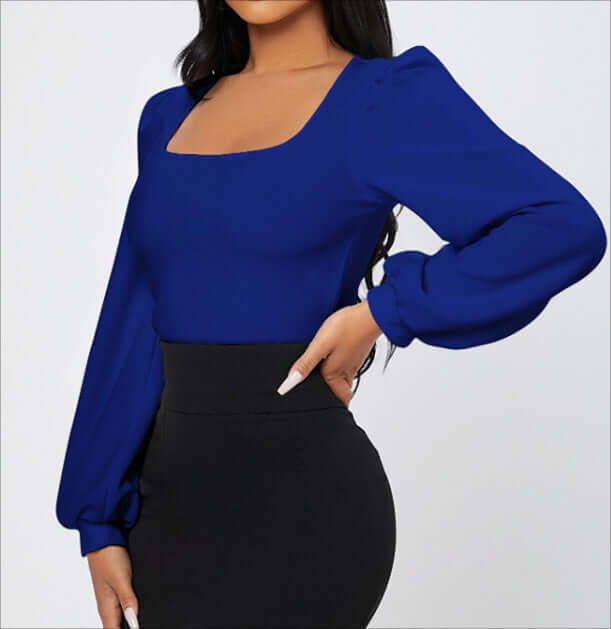 Ladies' Elegant Temperament Versatile Solid Color Long Sleeved Shirt in vibrant blue featuring long sleeves and a stylish design.