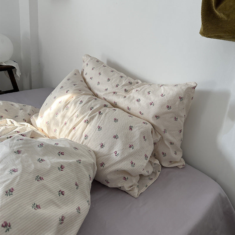 Ensemble de lit quatre pièces en coton : draps, housses de couette et draps-housses