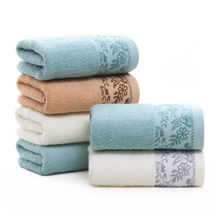 Toalha absorvente em algodão jacquard com estampado de flor de glicínia, 32 fios.