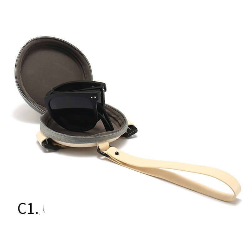 Trendy Foldable Sunglasses For Women TR Polarized Folding Sun Glasses in a stylish case with strap.
