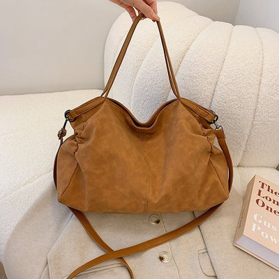 Versatile Large-Capacity Women's Bag in a warm brown color, perfect for everyday use and stylish organization.