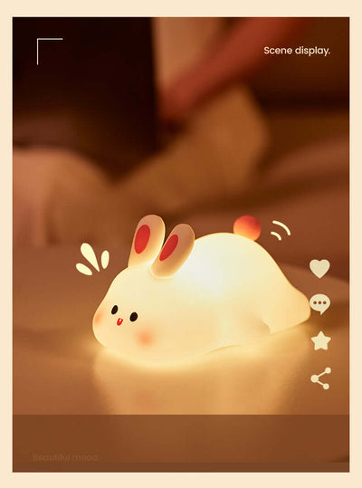 🐰 Soft Silicone Bunny Night Light – Touch-Control Lamp for Kids’ Rooms & Gifts, glowing bunny lamp viewed in a cozy setting.
