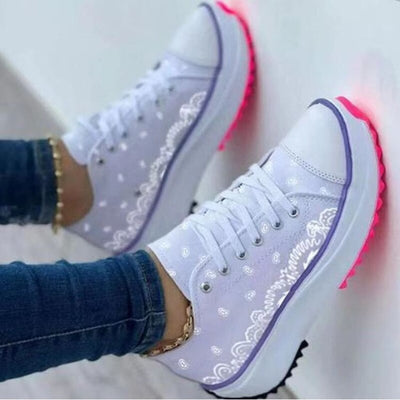 Pattern Canvas Women Sneakers Casual Sport Shoes featured on a model wearing jeans.