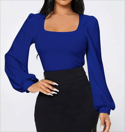 Ladies' Elegant Temperament Versatile Solid Color Long Sleeved Shirt in blue color, perfect for casual spring and summer styling.