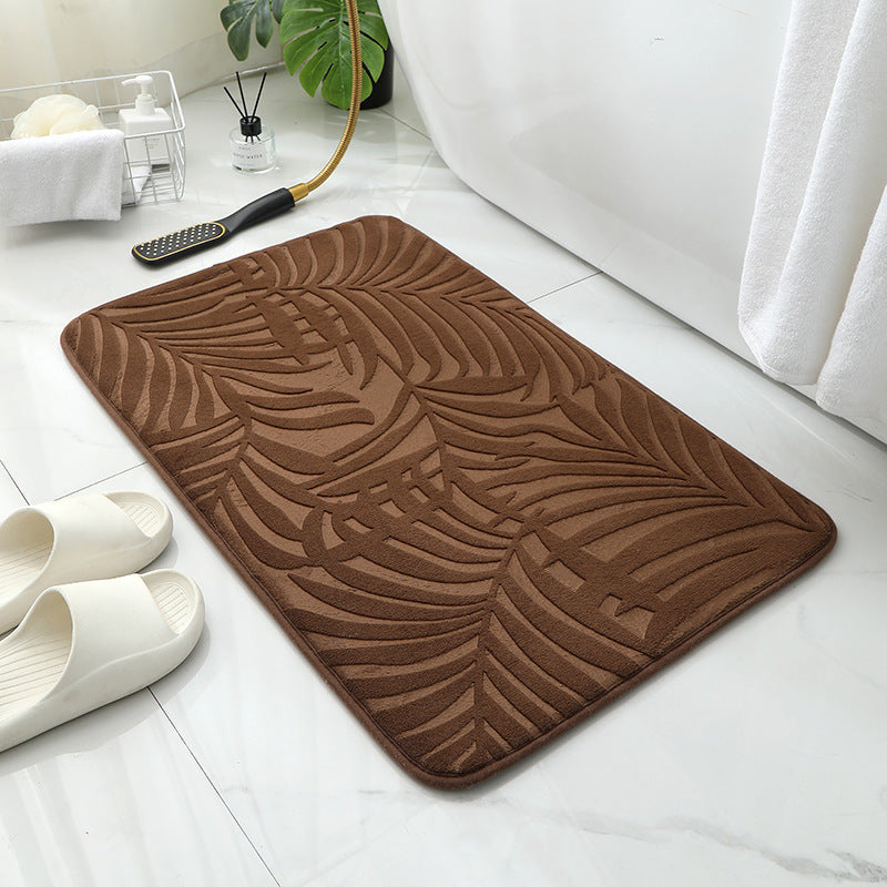 Tapis de sol absorbant antidérapant et moderne en éponge pour porte de salle de bain minimaliste.