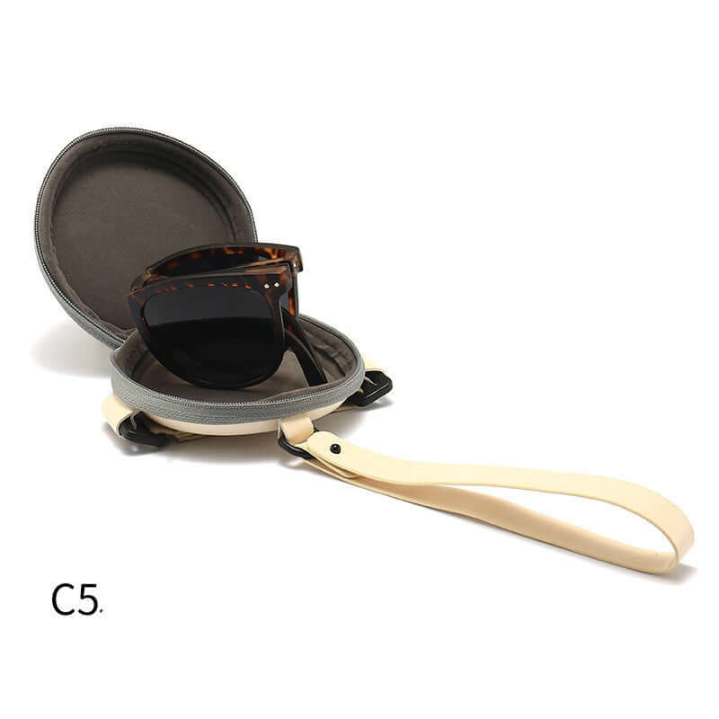 Trendy Foldable Sunglasses For Women TR Polarized Folding Sun Glasses displayed in a protective case.