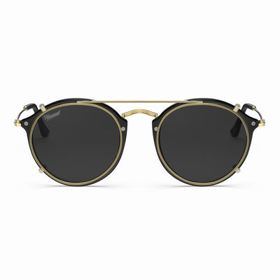 Vintage Heritage Clip-on sunglasses with black lenses and gold accents, featuring a stylish round frame.